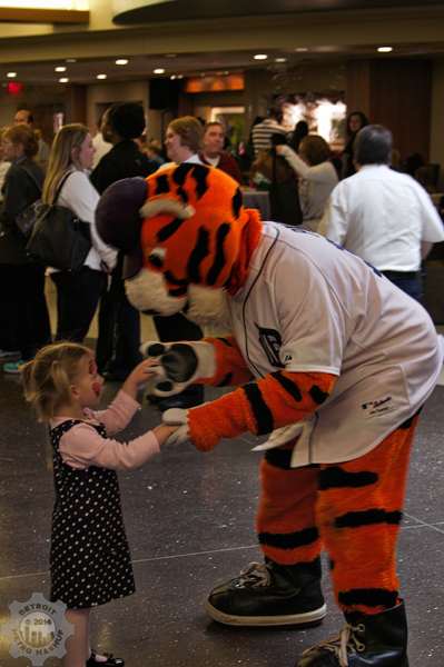 Detroit Tiger dances with a fan