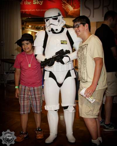 Imperial storm trooper and two fans